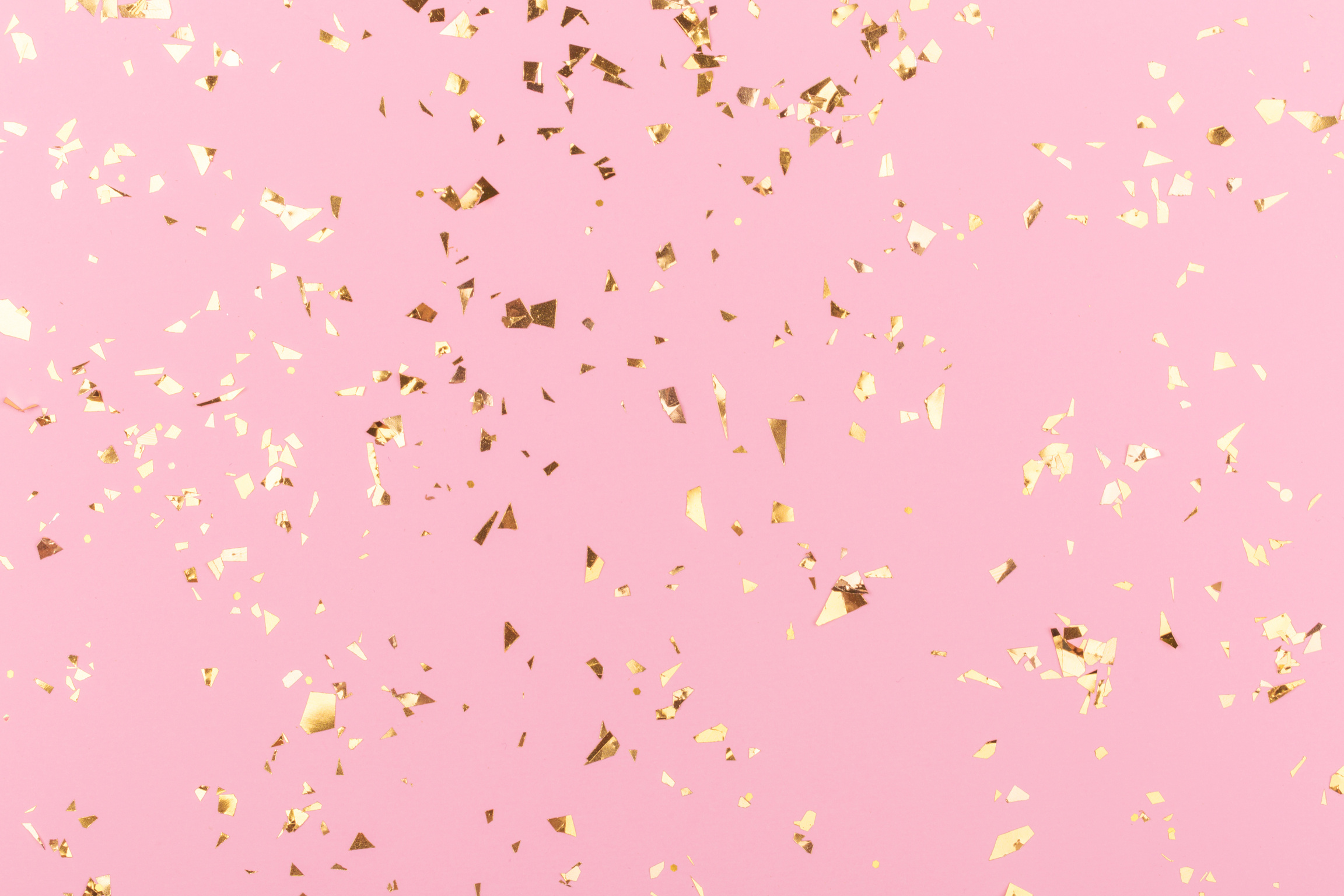Golden sparkles on pink